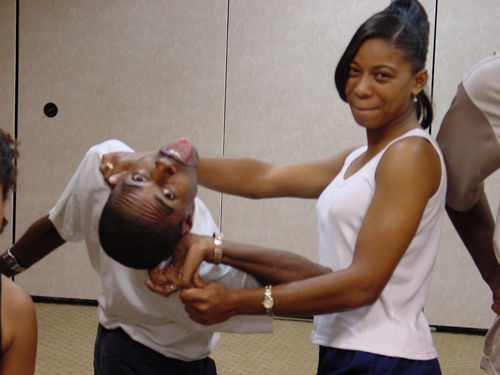 Rhonda practices ''finger break'' technique on Anthony at Martial Arts Workshop, Norfolk 2000 TAG TEAM Convention