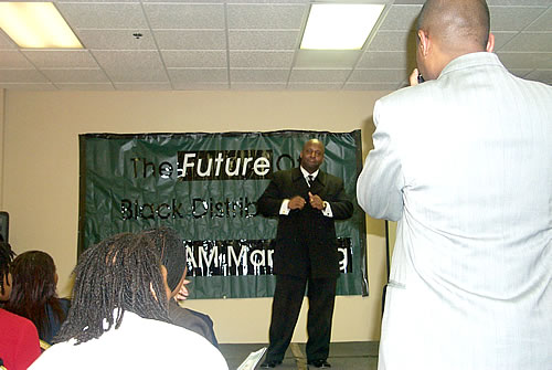 Jason on stage, Los Angeles, California Black Business Seminar