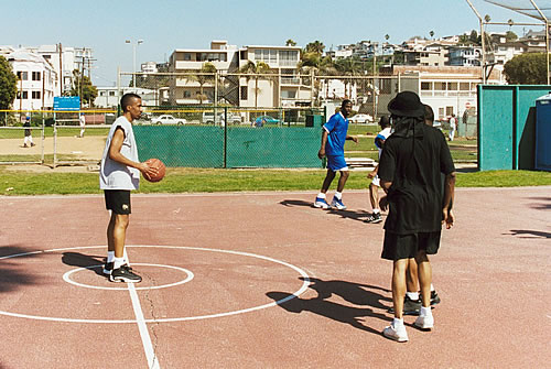 TAG TEAM brothers playing basketball.  Yaba with the ball., Los Angeles, California TAG TEAM Beach Party