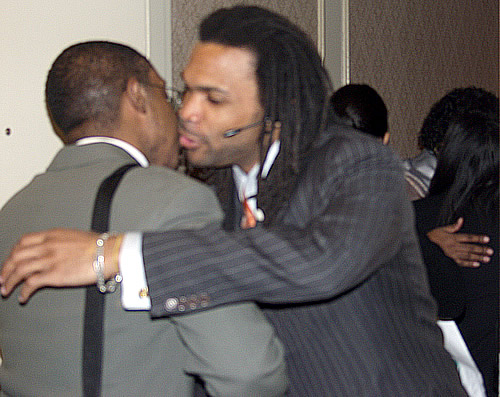 Erroll greeting brother as he enters the seminar, Detroit, Michigan Black Business Seminar