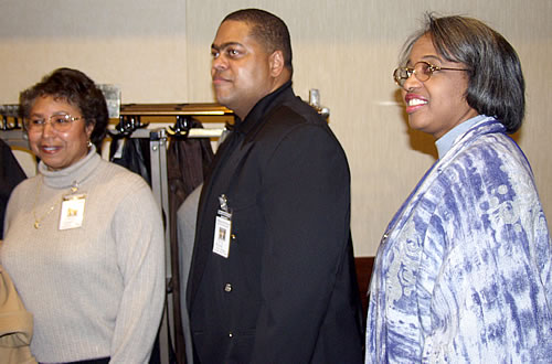 Sisters and Brother waiting for seminar to begin, Detroit, Michigan Black Business Seminar