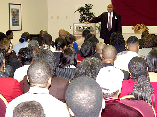 Delxino speaking to audience, Los Angeles, California Black Business Seminar