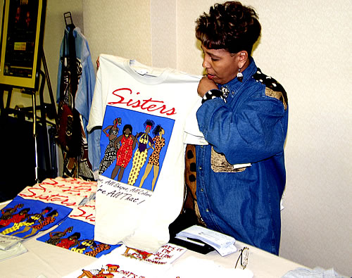 Vendor displaying her custom T-shirts, Los Angeles, California Black Business Seminar