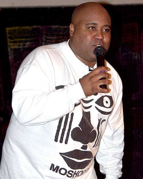 Delxino speaking to audience, New York City Black Business Seminar