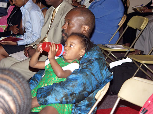 Father and daughter enjoying the event, New York City Black Business Seminar