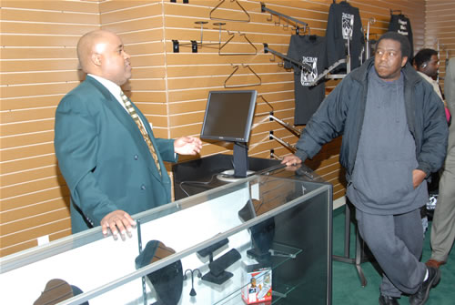 Delxino explaining function of TAG TEAM Store, TAG TEAM Marketing Atlanta Facility Grand Opening