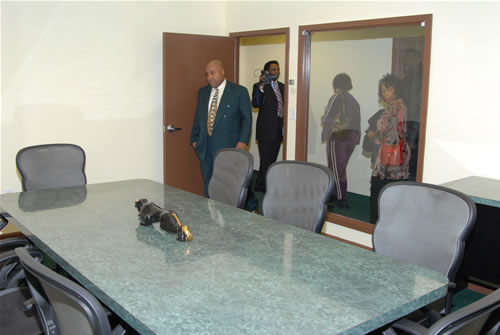 Delxino leading guests into the Conference Room, TAG TEAM Marketing Atlanta Facility Grand Opening