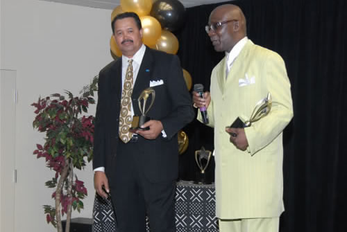 Gilbert and Oliver accepting the 2006 Black Manufacturer of the Year Award, 2007 TAG Awards Show