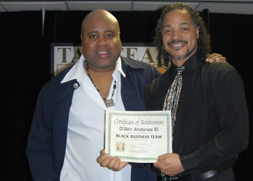 Delxino and D'Akh displaying his award certificate, 2007 TAG Awards Show