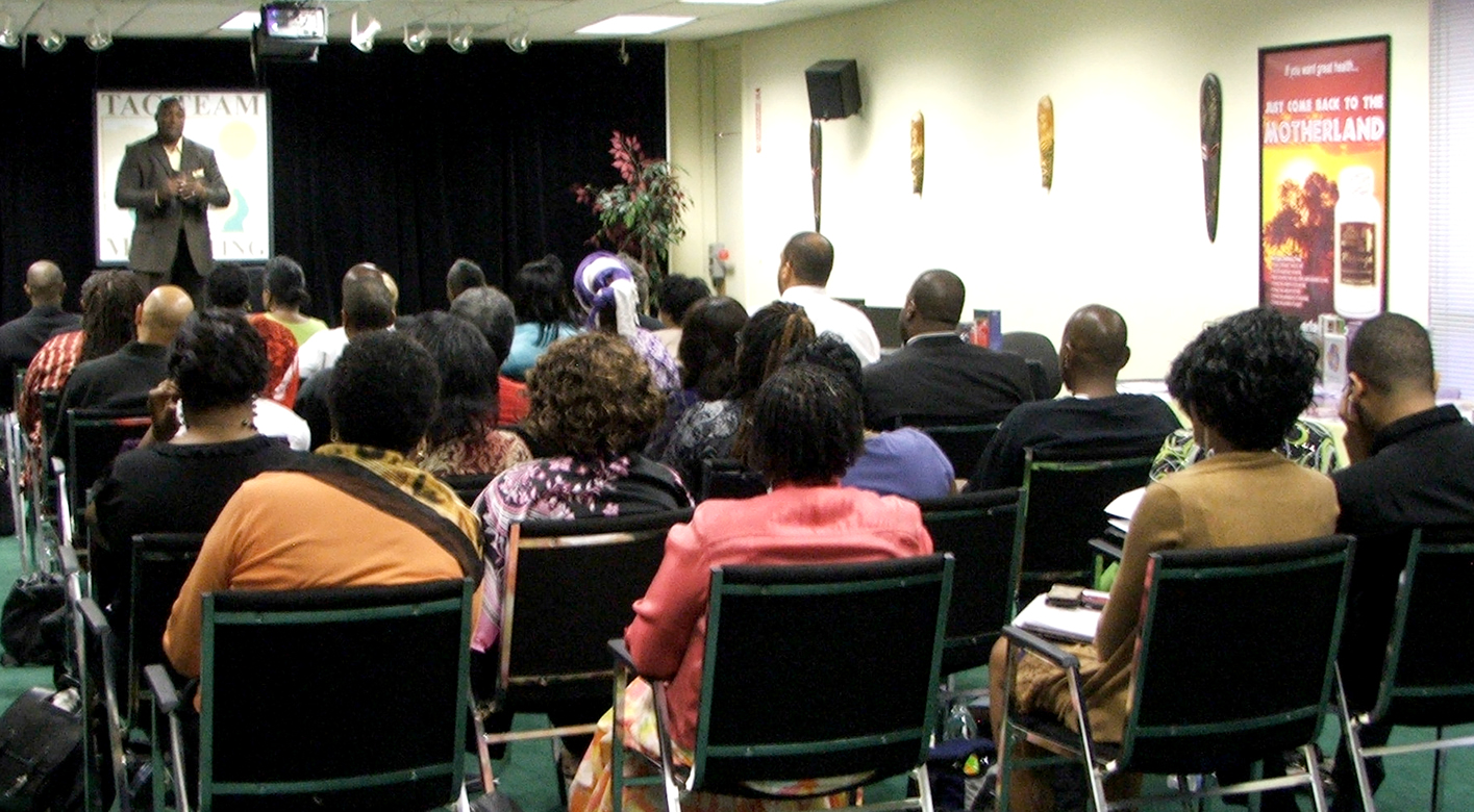 Mark Anthony Garrett Speaking To Audience